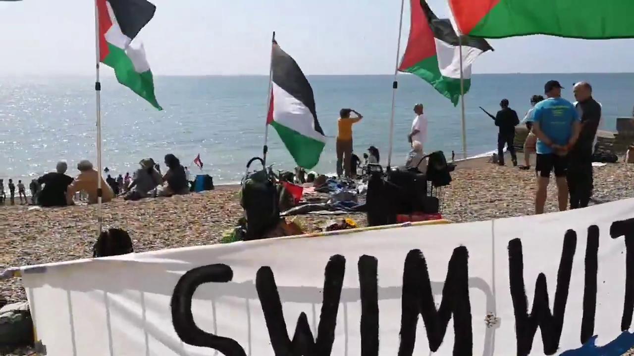 Video thumbnail for UK: Swim With Gaza Event Held on Beach in Brighton and Hove.