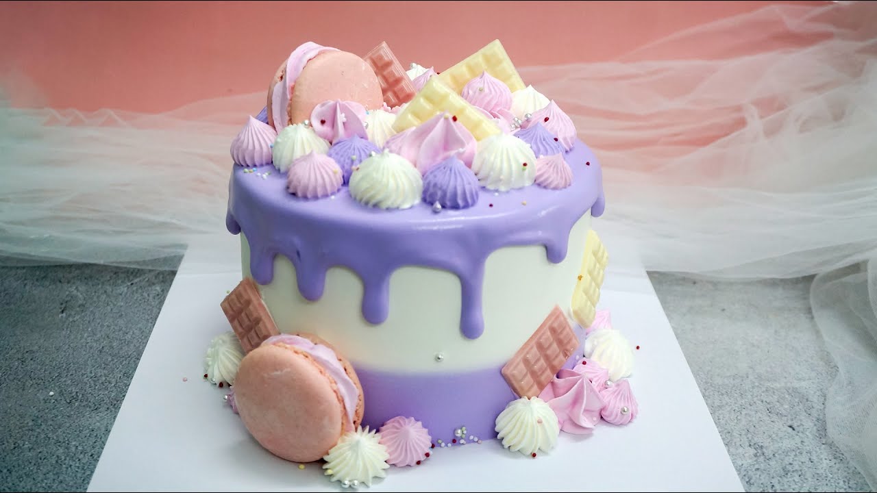 'Video thumbnail for Beautiful purple cream drip cake decoration with macaron and chocolate for birthday'