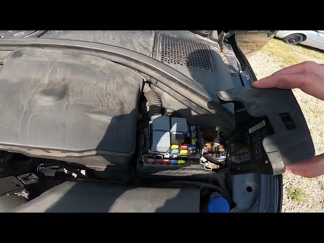 Video thumbnail for Where is Fuse Box Under the Hood in VOLVO V70 III ( 2007 – 2016 ) - Find Fuse Box