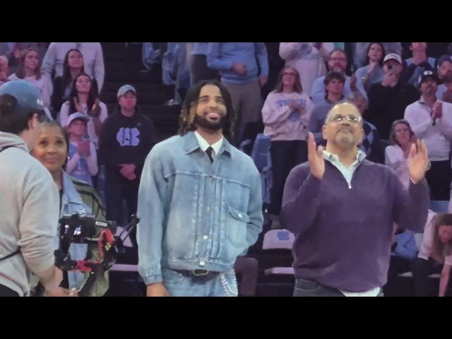 Video thumbnail for RJ Davis halftime ceremony celebrating his jersey going up in the rafters #UNC