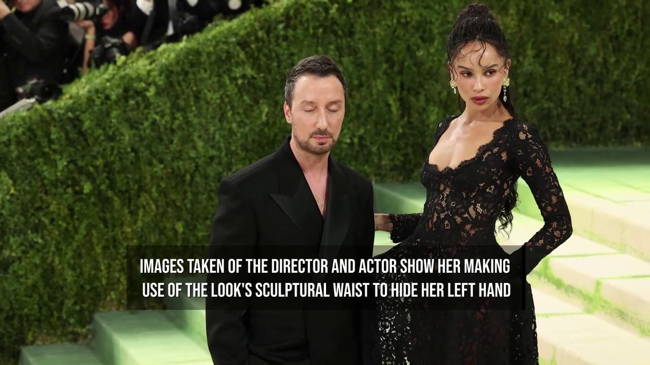 Video thumbnail for Zoe Kravitz hides engagement ring on Met Gala red carpet.