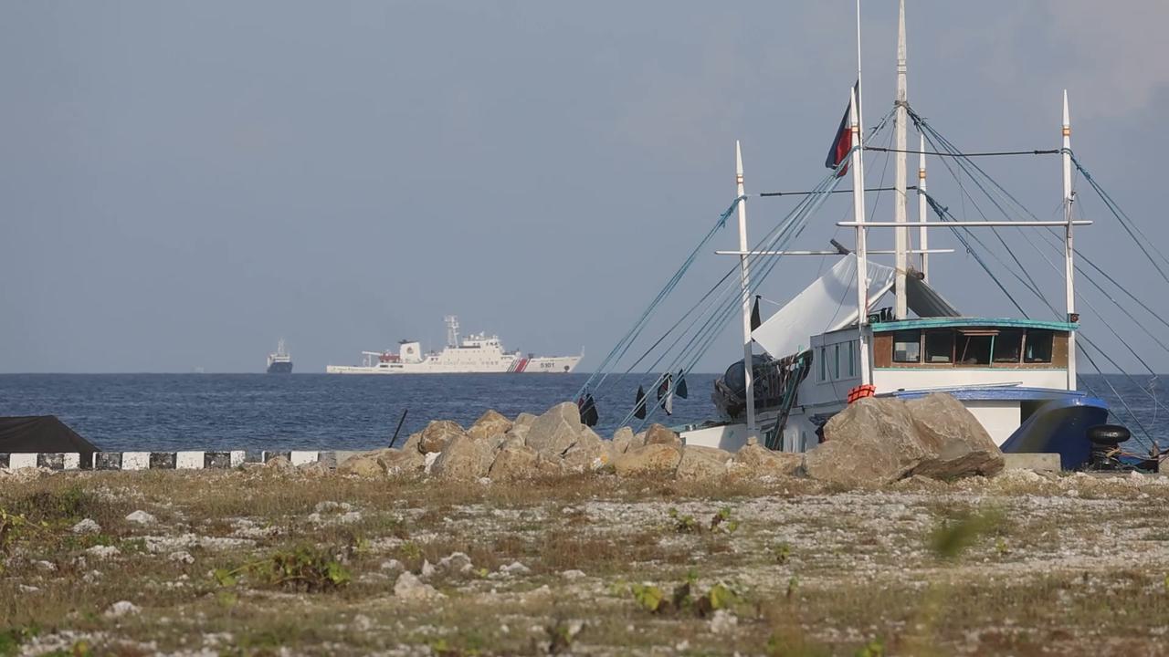 Video thumbnail for Philippines: Chinese vessels approach disputed Thitu Island, Philippine marines conduct patrols.