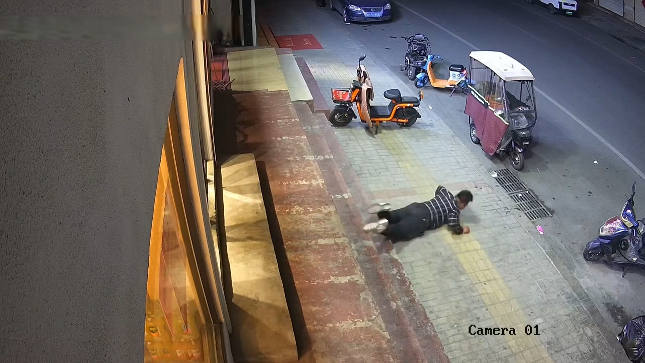 Video thumbnail for Unexpected Tumble Outside Shop in Shandong