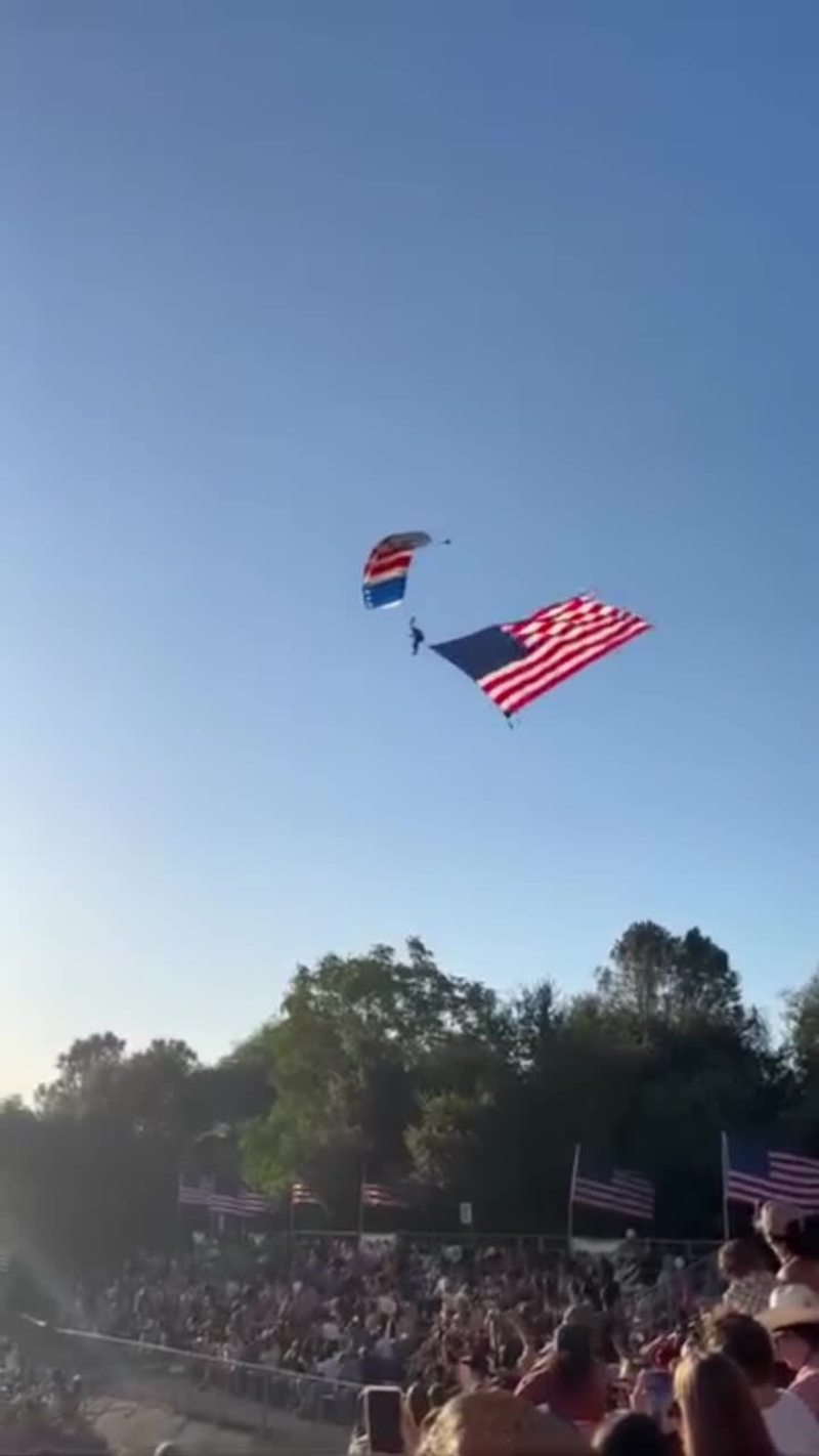 Video thumbnail for Skydiver with Giant Flag Makes Wild Landing at Folsom Rodeo