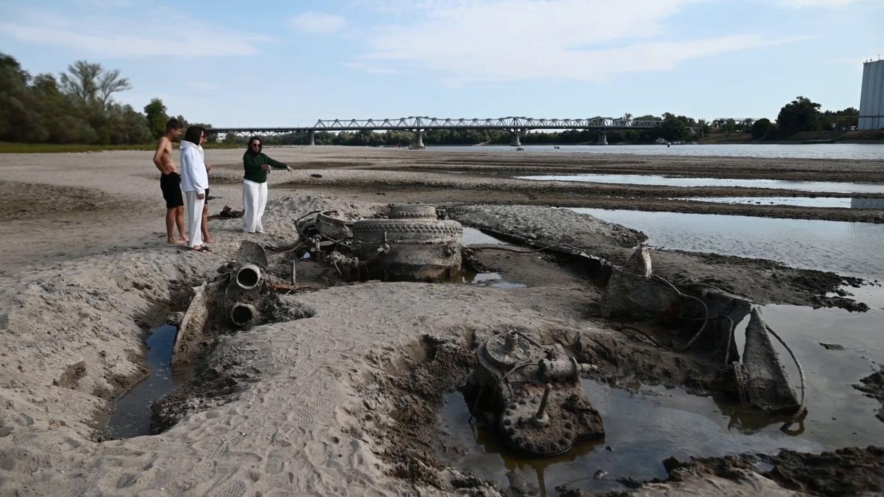 Video thumbnail for Hungary: World War II shipwreck emerges in Hungary's Danube River as drought drops water levels.