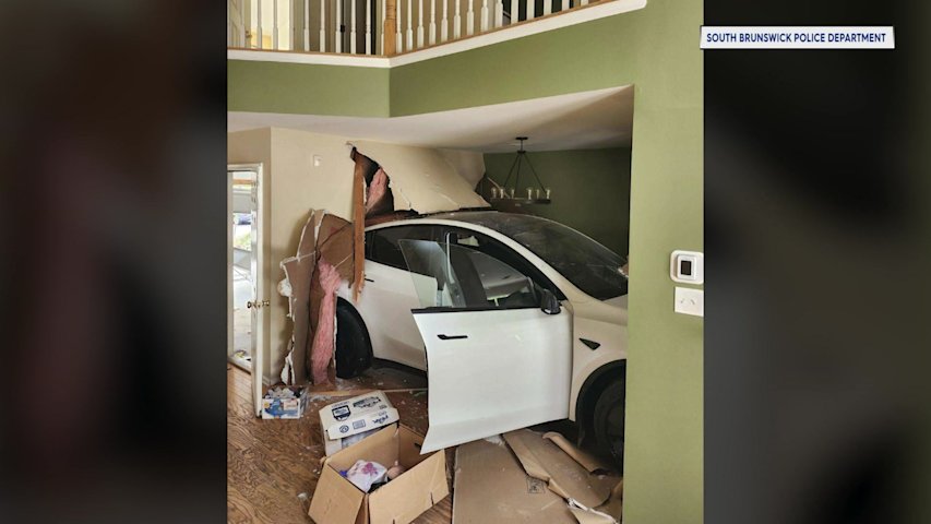 Video thumbnail for Crash lands Tesla in kitchen of South Brunswick home