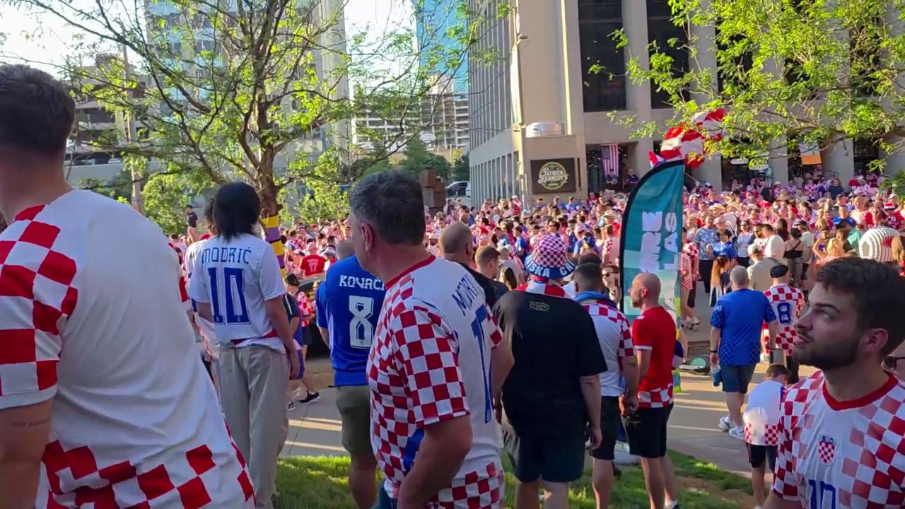 Video thumbnail for US: Croatia Fans Take Over Downtown Dallas In Massive Red And White March.