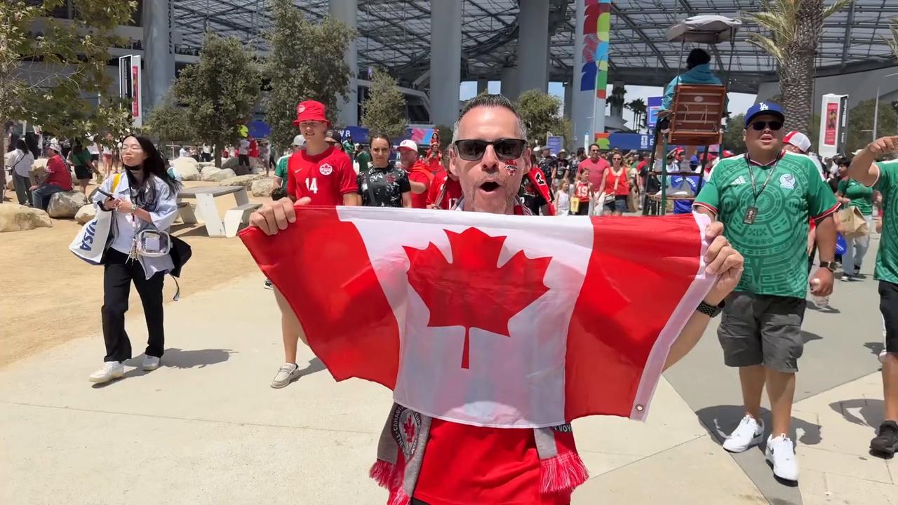 Video thumbnail for US: Canada fans celebrate after team becomes first to reach World Cup round of 16.
