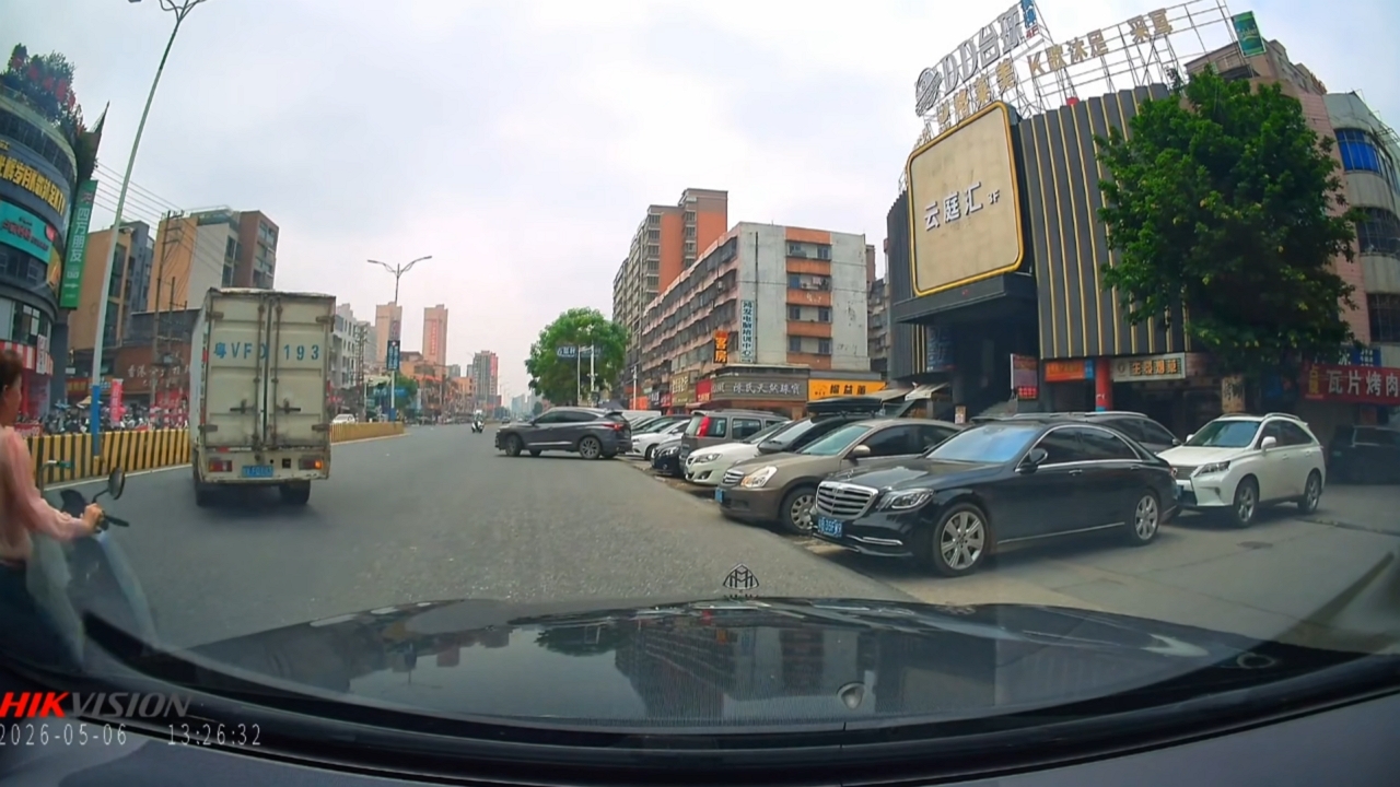 Video thumbnail for Motorcycle Crashes Into Car After Truck Passes in Guangdong