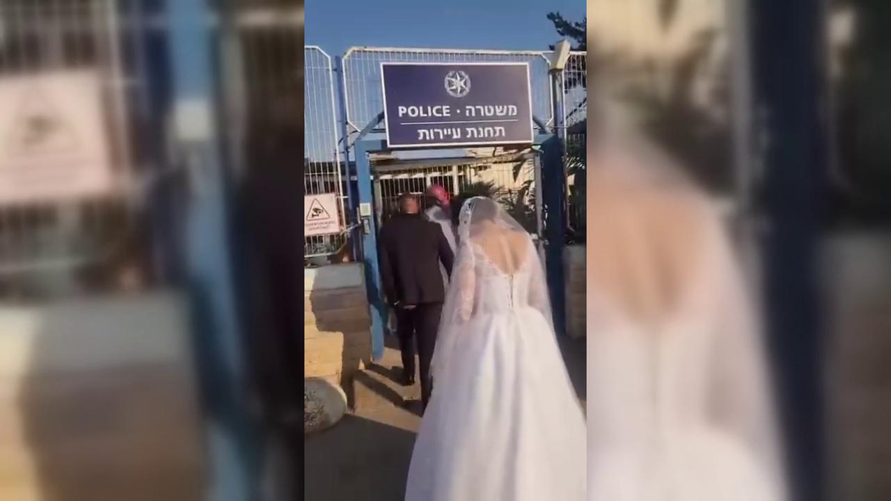 Video thumbnail for Israel: Palestinian Bride and Groom Detained During Wedding Procession.