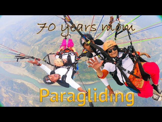 Video thumbnail for 70 years old mom paragliding & singing 🎼.