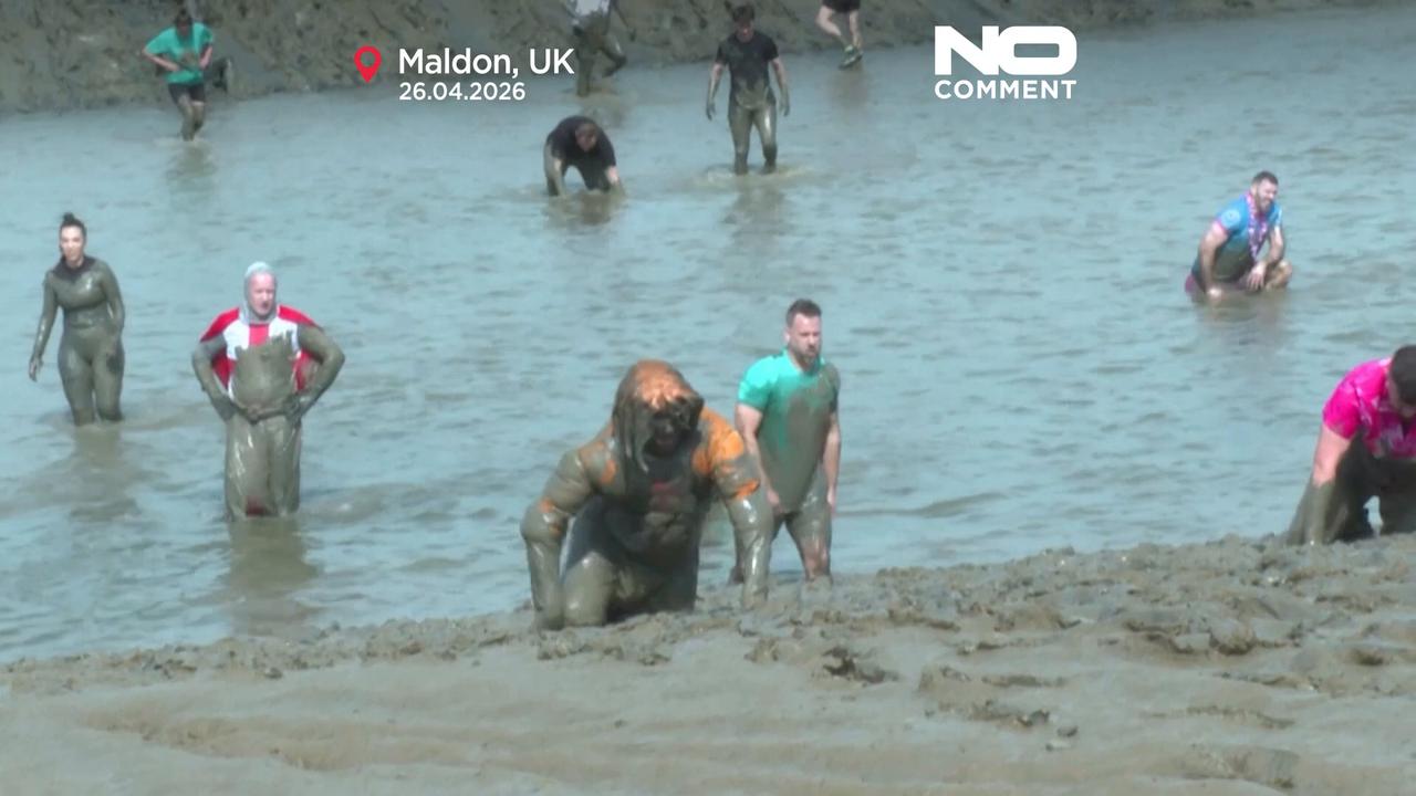 Video thumbnail for Runners battle mud at annual UK charity race