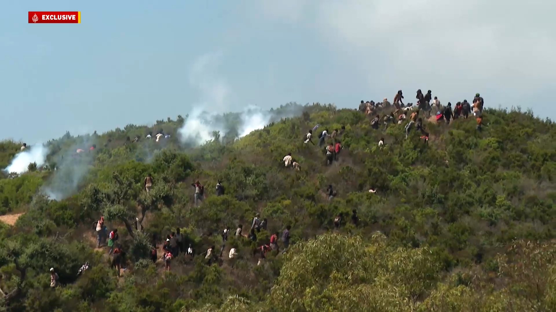Video thumbnail for Moroccan Police Intercept Migrants Heading for Ceuta Enclave