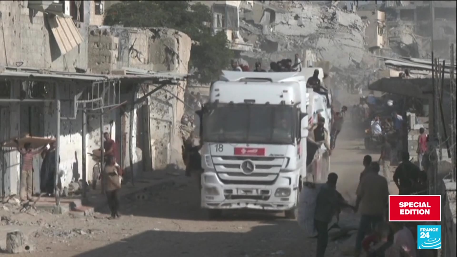 'Video thumbnail for Aid trucks trickle into Gaza'