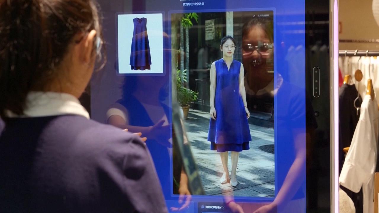 Video thumbnail for China: AI mirrors reflect fashion's future in China.