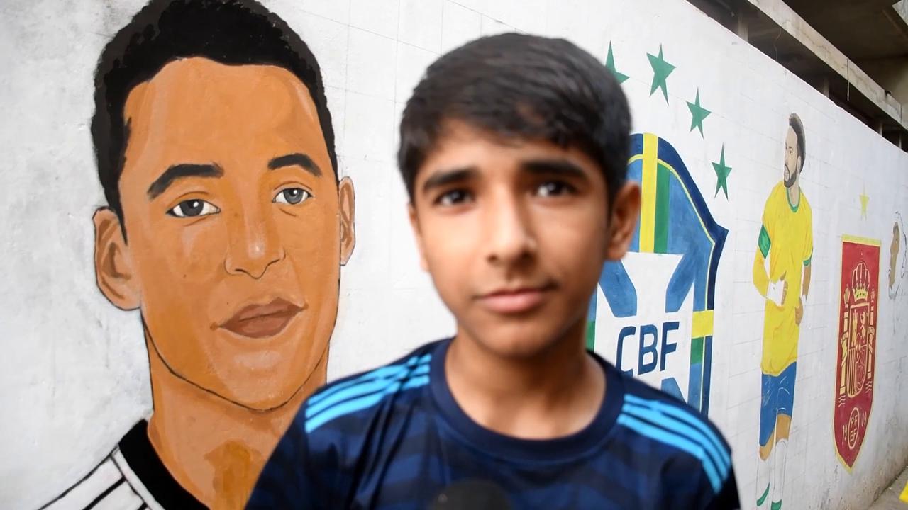 Video thumbnail for Pakistan: Karachi children celebrate upcoming World Cup with street soccer.