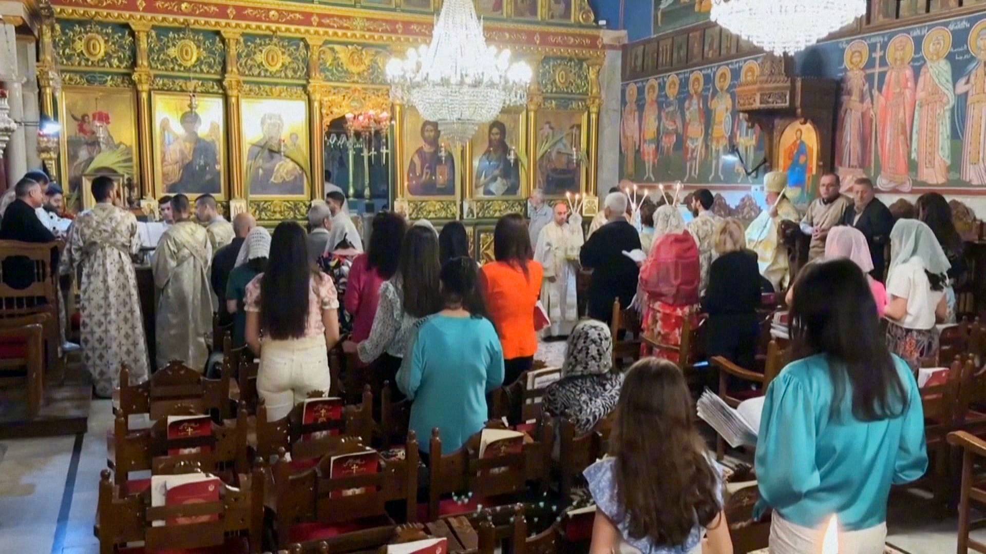 Video thumbnail for Voices of Gaza: Christians mark Palm Sunday in bomb-damaged church, praying for peace