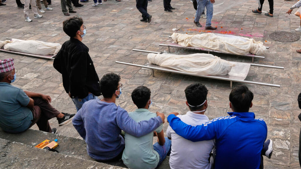 Video thumbnail for Nepal struggles to identify the remains found in floods