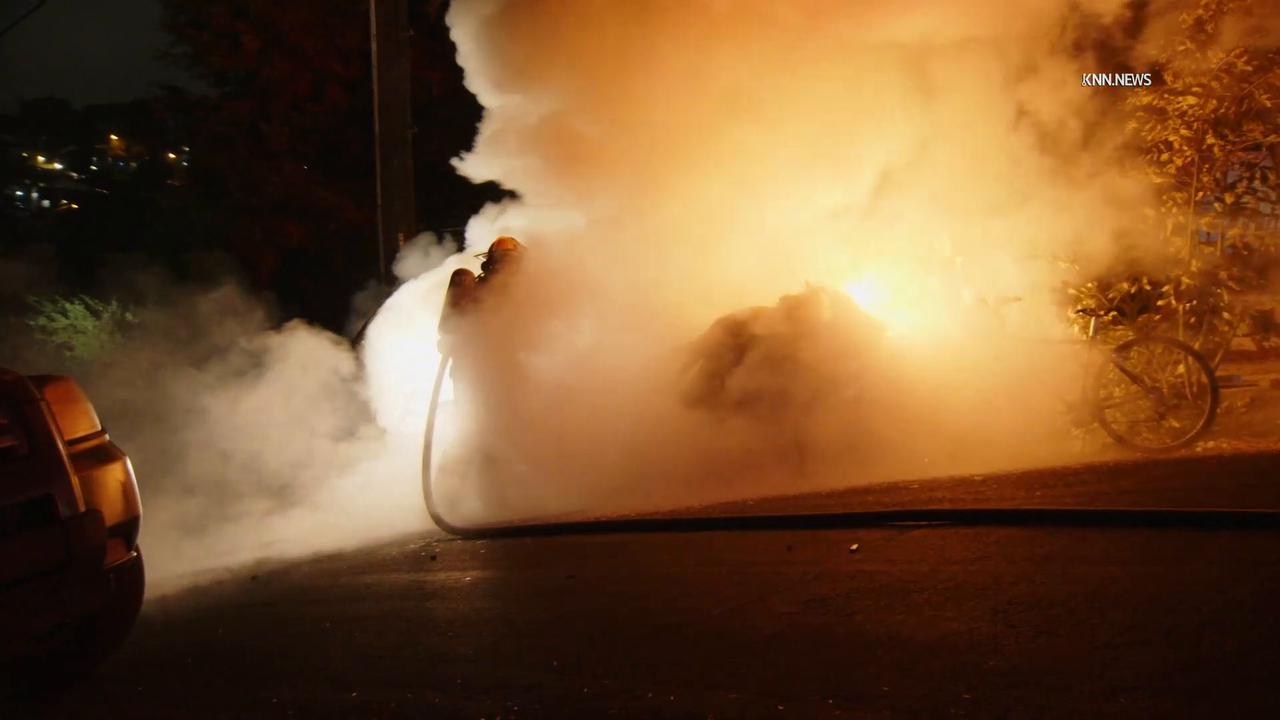 Video thumbnail for US, Los Angeles: Echo Park Auto Fire on Steep Hill.