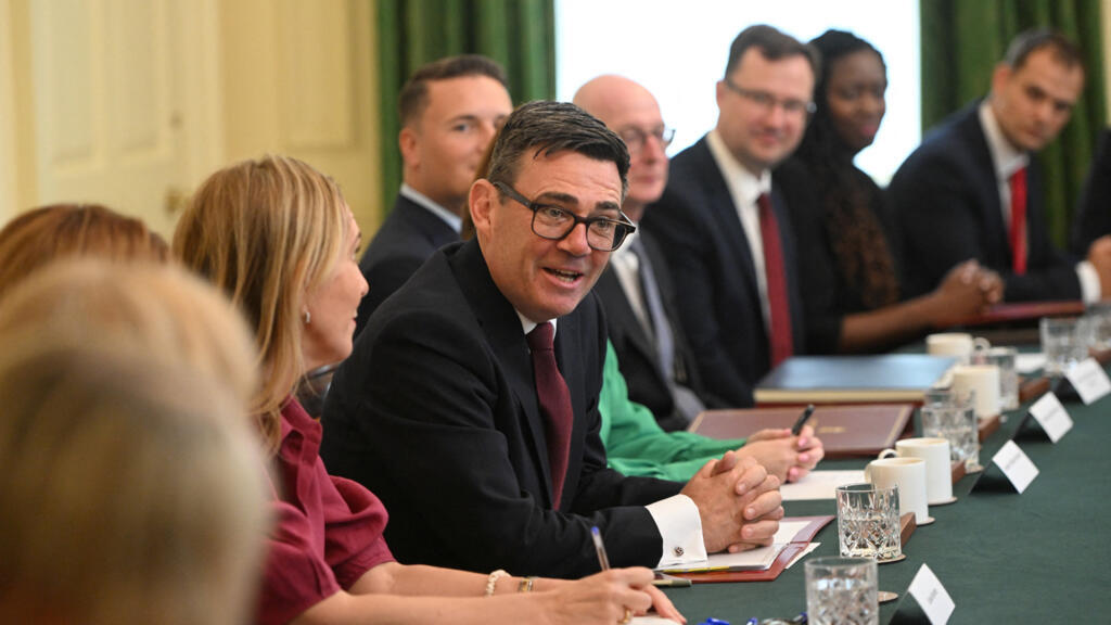 Video thumbnail for 'We've got to be prepared to reprioritise': UK's PM holds first cabinet meeting