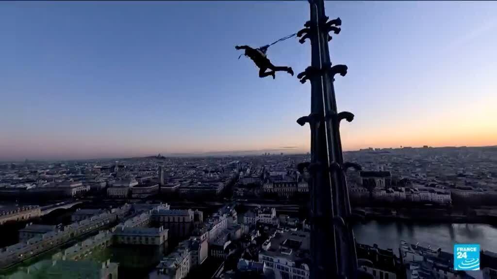 Video thumbnail for A man scaled Notre-Dame de Paris before jumping off with a parachute