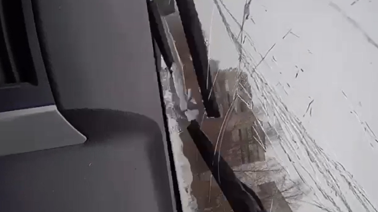 Video thumbnail for Giant Icicle Shatters Windshield, Misses Driver by Inches!