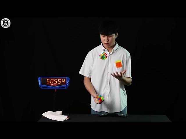 'Video thumbnail for Fastest Juggle and Solve of Three Cubes EVER!'