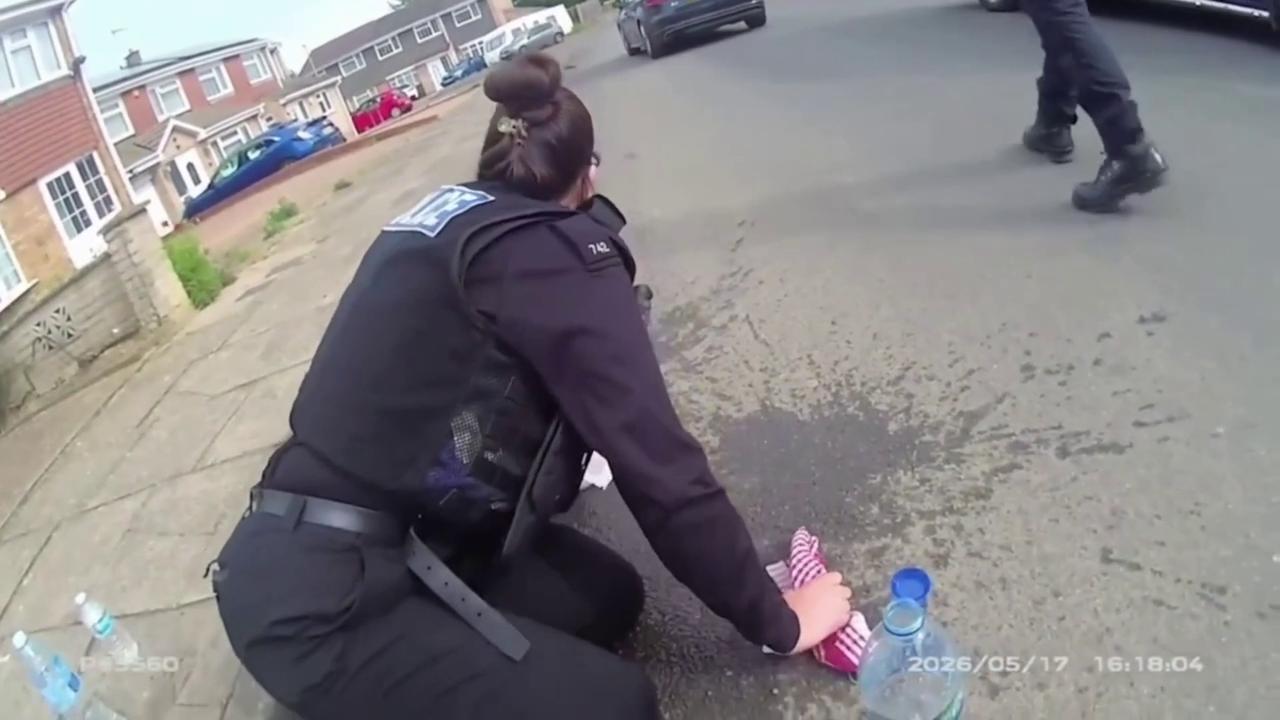 Video thumbnail for UK: Police Officer Hit With Pepper Spray During Doorstep Arrest In UK.