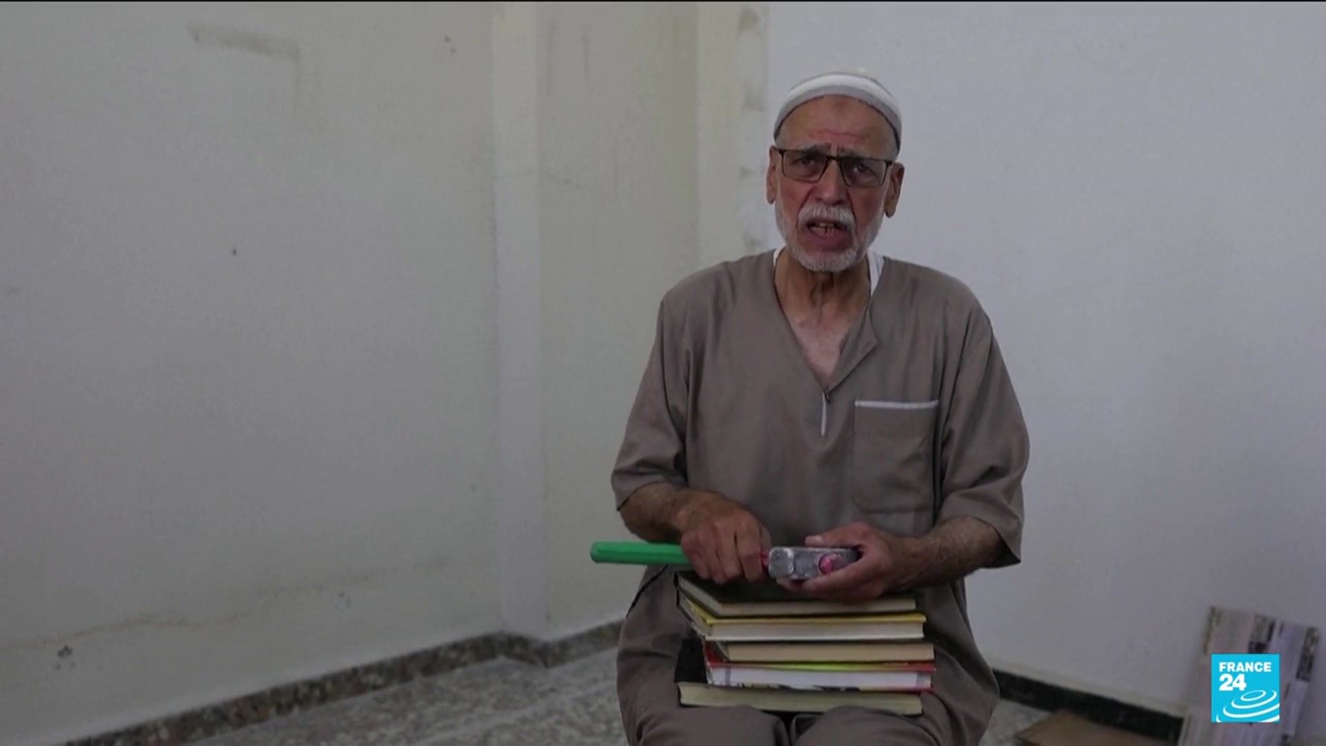 Video thumbnail for Syrian man reunited with secret library hidden for 15 years
