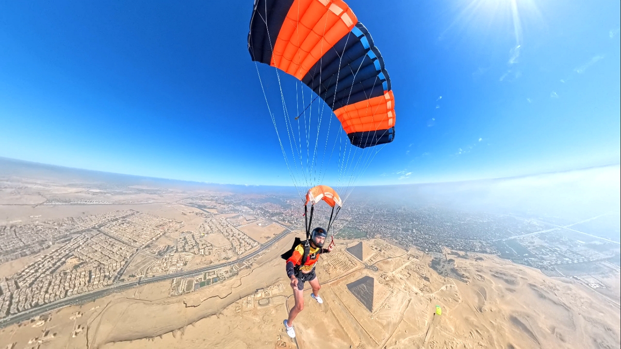 Video thumbnail for Aerial View of the Pyramids During Cairo Skydiving Festival