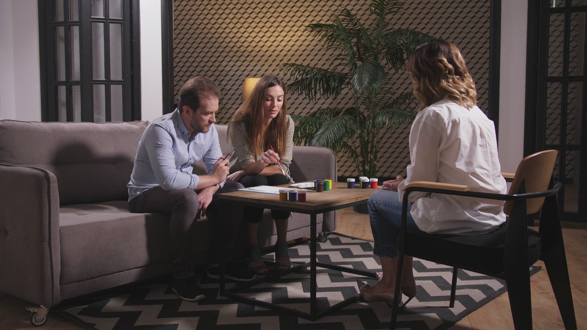 Video thumbnail for couple-talking-to-counselor-looking-at-drawing-SBV-337629480-HD