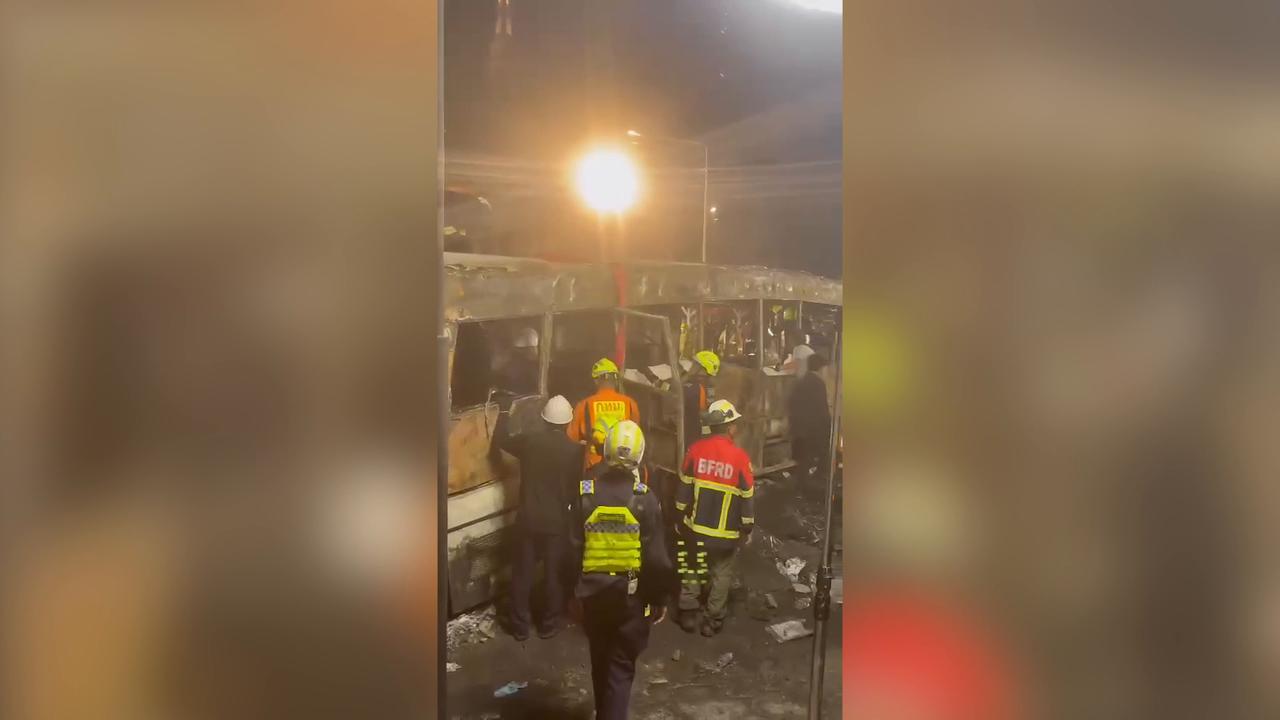 Video thumbnail for Thailand: Firefighters clear wreckage after train collides with bus in Bangkok.