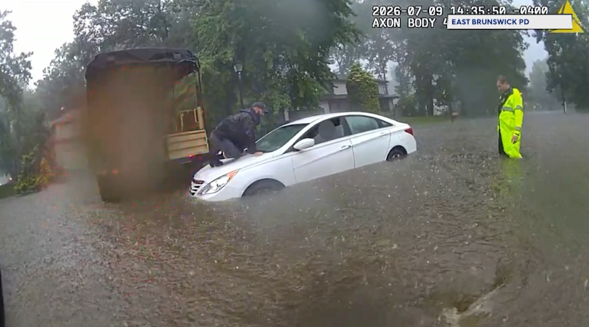Video thumbnail for East Brunswick police rescue two people trapped in car during flash flooding
