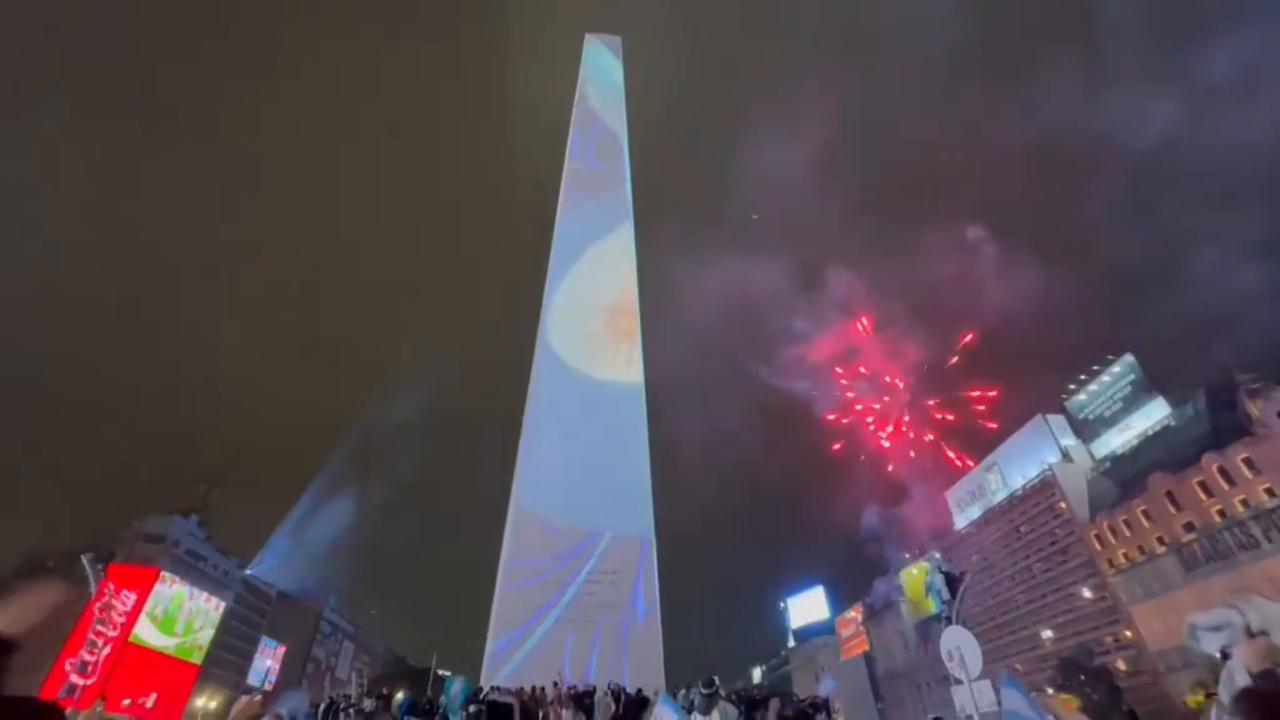 Video thumbnail for Argentina: Argentina Fans Flood Buenos Aires' Obelisco With Fireworks and Flags Despite World Cup Final Defeat.