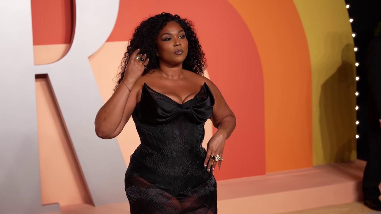 Video thumbnail for UNCAPTIONED: Lizzo insists she didn't scrap her Love in Real Life album.