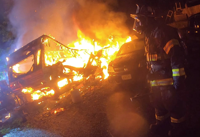 Video thumbnail for Fire engulfs camper in Orange County, destroying nearby vehicle and threatening house