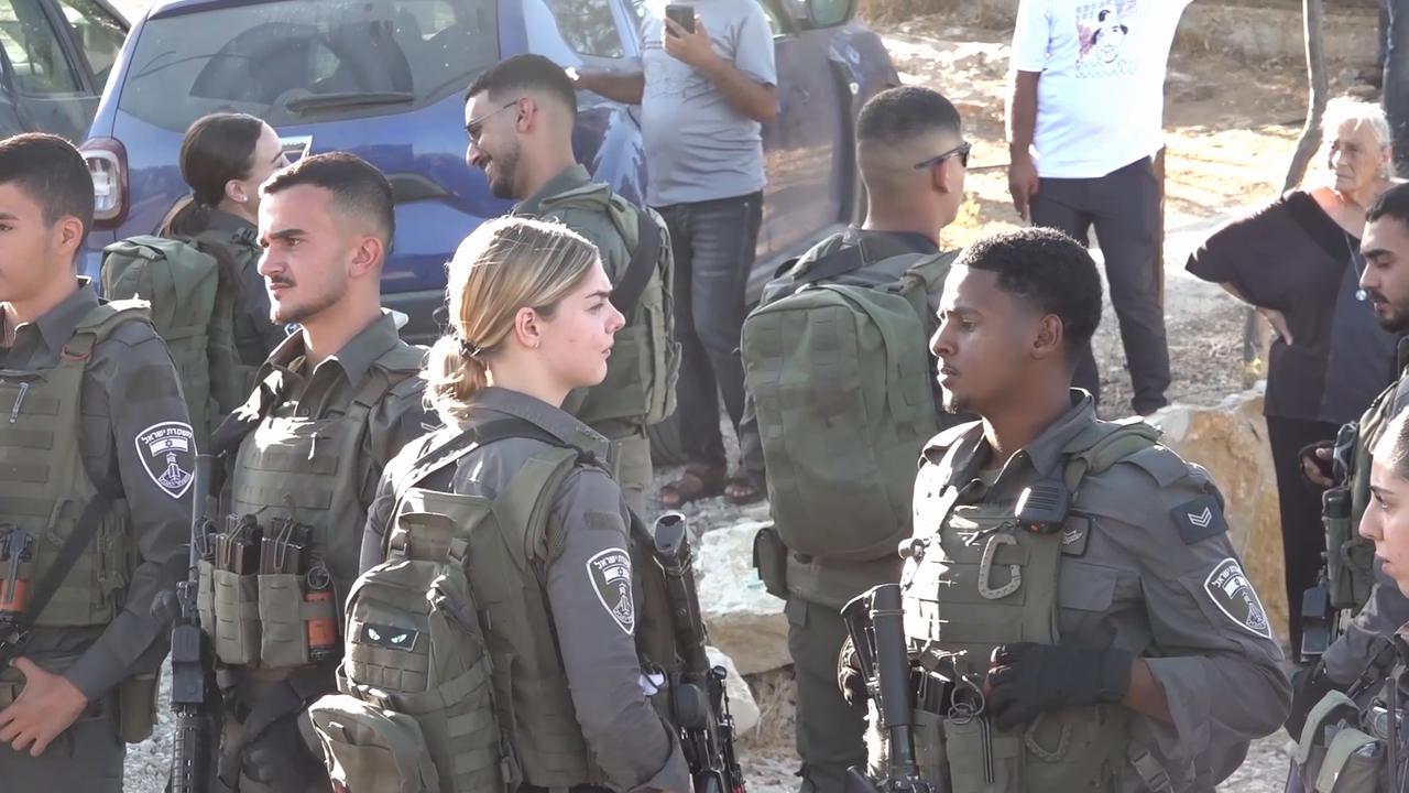 Video thumbnail for Israeli forces disrupt memorial for slain Palestinian activist Awdah Hathaleen.