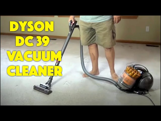 Video thumbnail for Dyson DC39 Ball Multi Floor Vacuum Cleaner REVIEW