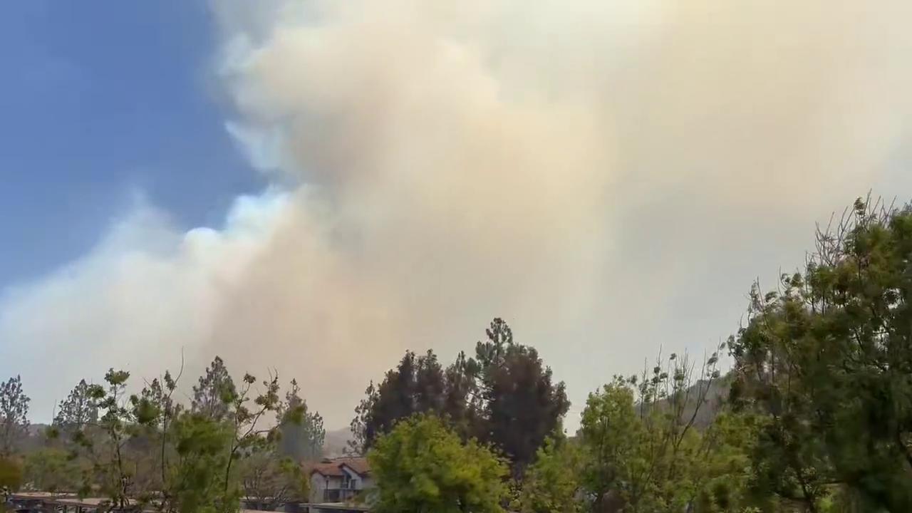 Video thumbnail for US: Fast-Moving Sandy Fire Burns More Than 800 Acres, Prompting Evacuations.