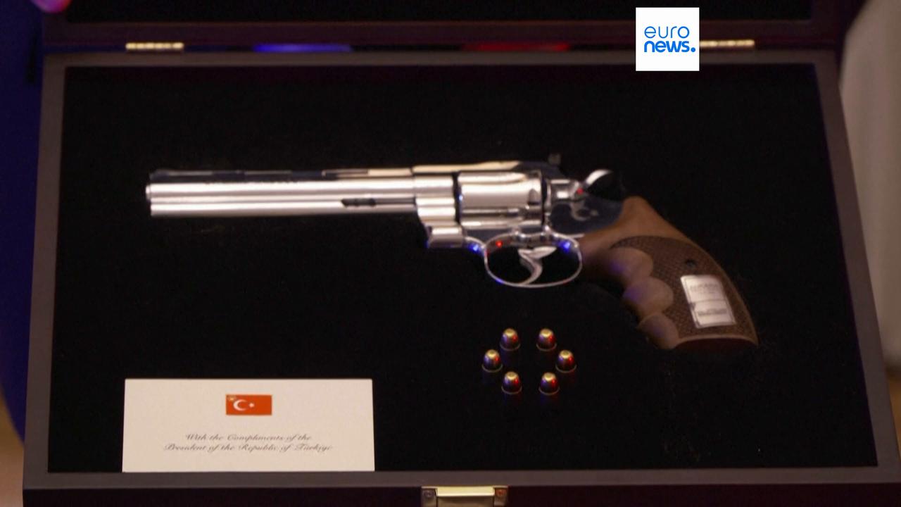 Video thumbnail for Newly released footage shows revolver gifted by Erdogan to NATO leaders