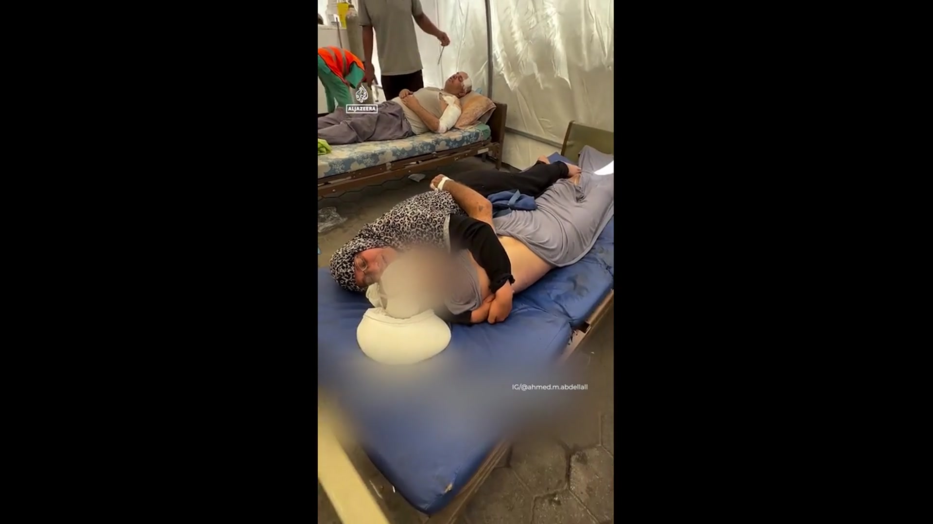 'Video thumbnail for Palestinian woman clings to her husband killed in Israeli attack'