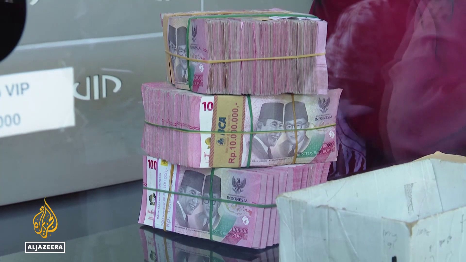 Video thumbnail for Indonesian currency slides: Inflation makes it harder for people to afford food