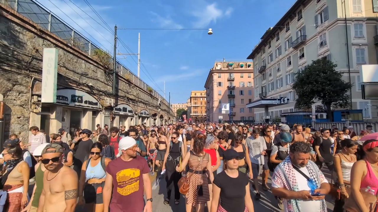 Video thumbnail for Italy: Demonstrators march in Genoa on 25th anniversary of G8 Summit.