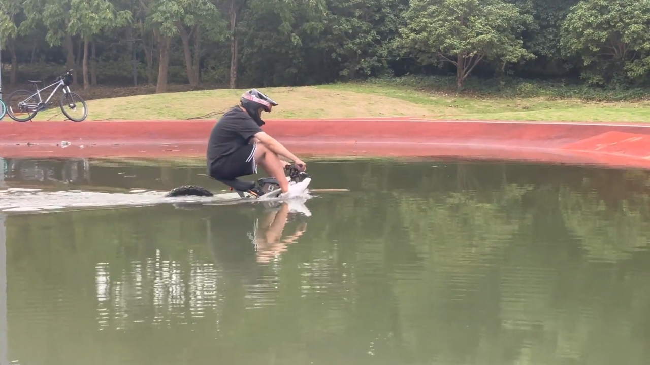 Video thumbnail for Cyclist Rides Through Deep Water in Jiangsu, China