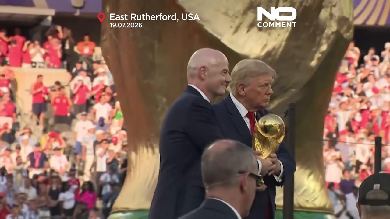Video thumbnail for Trump and Infantino hand World Cup trophy to Spain