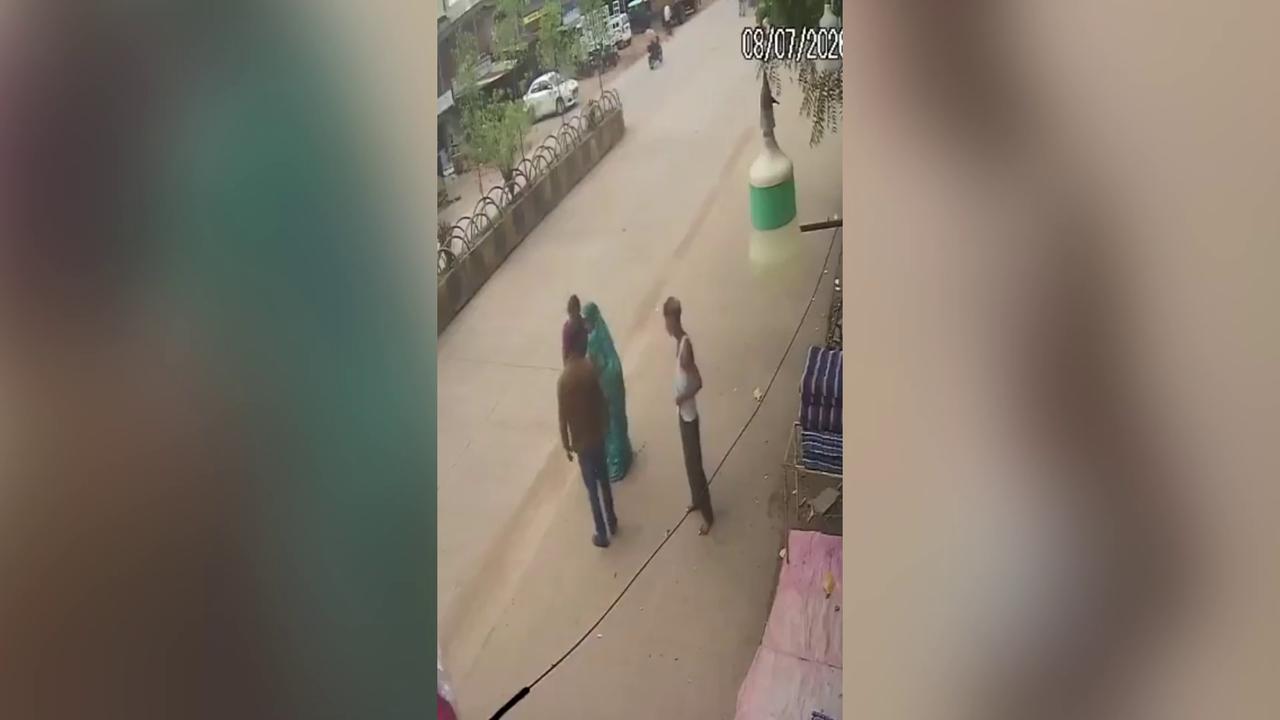 Video thumbnail for India: School van rear gate left unlocked as child falls onto busy road during drop-off.
