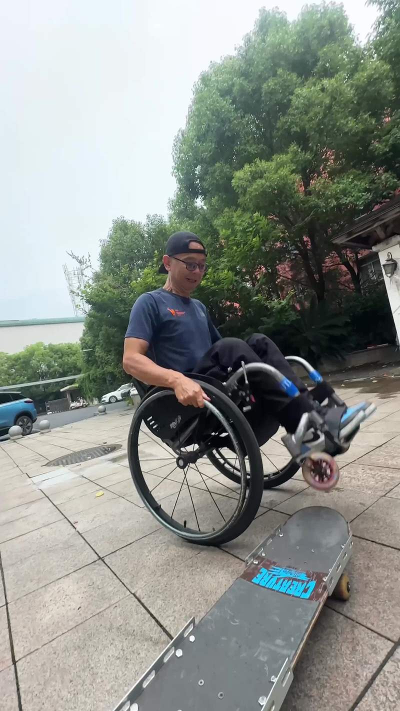 Video thumbnail for Wheelchair Skateboarding Training with Wide Angle Street Shots