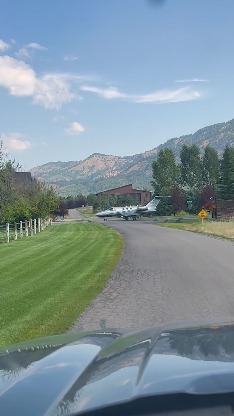 Video thumbnail for Private Jet Taxiing across a Quiet Neighborhood Road