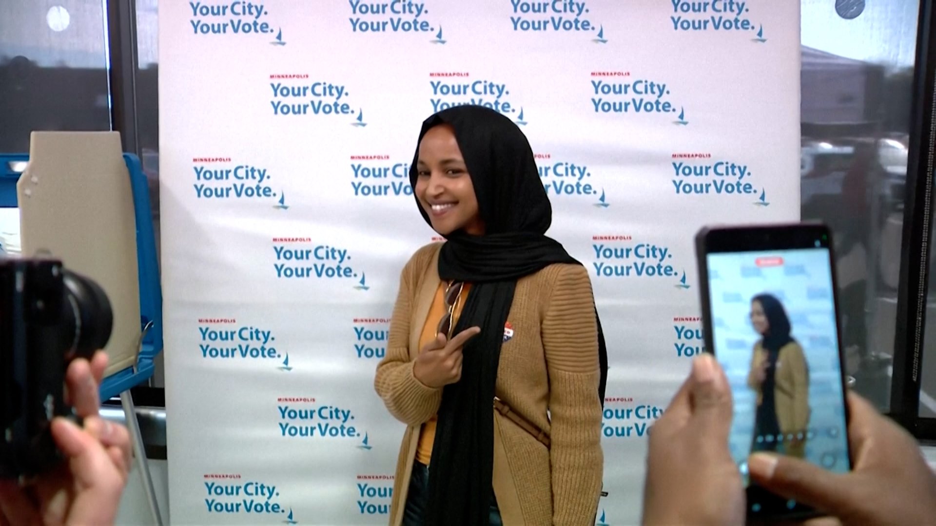 Video thumbnail for Ilhan Omar votes as Trump renews attacks amid federal probe
