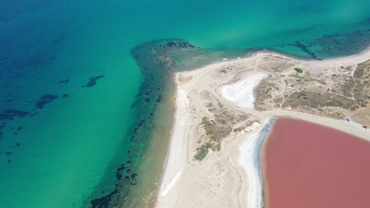 Video thumbnail for Türkiye: DRONE - Türkiye’s Heart Lake turns pink in summer heat.